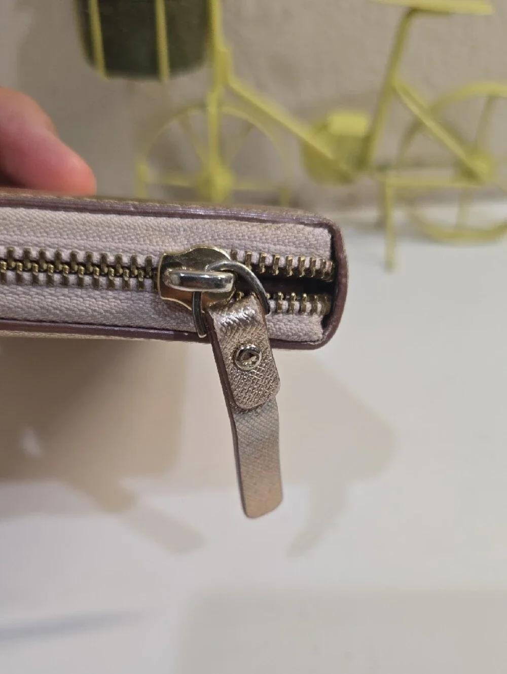 kate spade metallic rose gold zip-around continental wallet